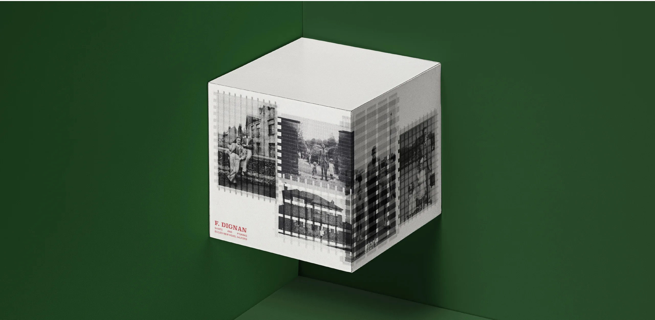 Exhibition cube for MCRBCN faced with halftone family photographs and the F. Dignan factory mark, on a green ground