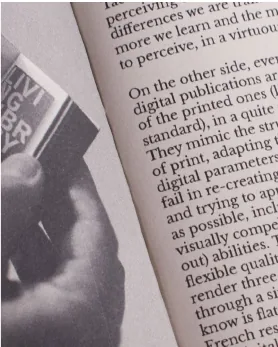 A Sense of Reality, a palm-sized publication held open mid-read